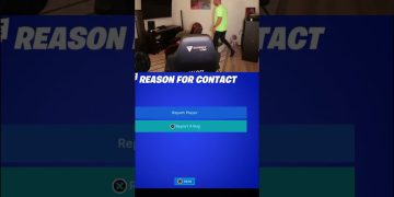 Gamer selecting report option in game menu.