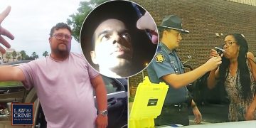 Police enforce a roadside breathalyzer test.