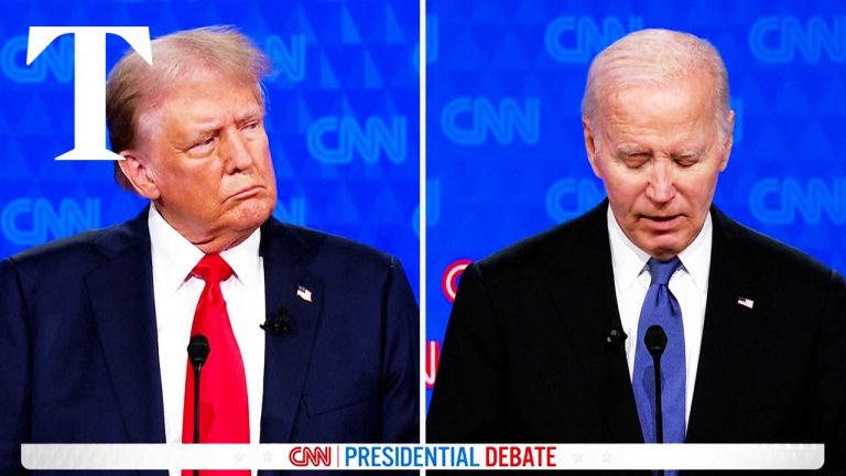 Presidential debate on CNN, two candidates on stage.