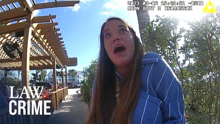 Shocked woman outdoors under wooden pergola