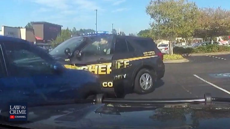 Police car involved in parking lot accident