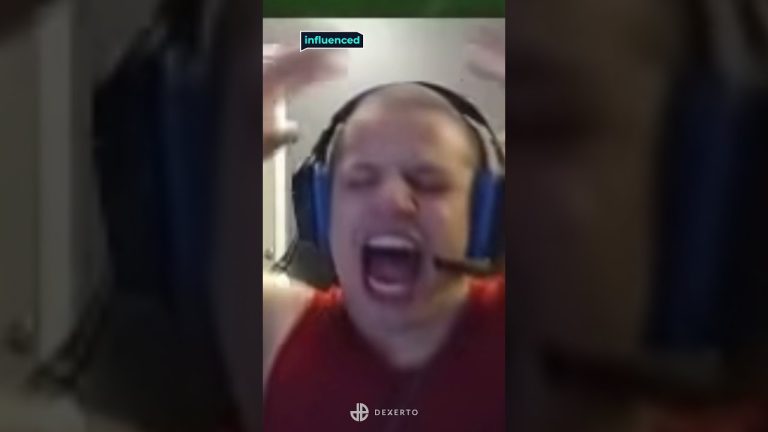 Person shouting while wearing a headset.