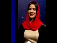 Woman in red scarf on TV set