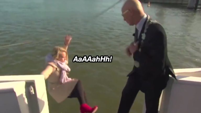 Person falling off boat into water