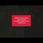 Massachusetts police helicopter pursues Connecticut suspects.