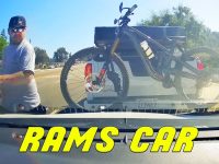 Driver encounters car with bike rack.