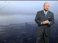 Man presenting weather forecast cloudy city view