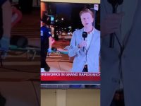 Reporter covering Grand Rapids fireworks event