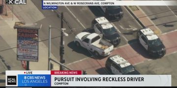 Police chase pickup truck in Compton intersection