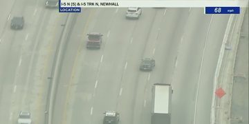 Traffic on I-5 freeway, Newhall, moving smoothly.