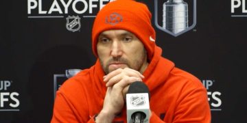 Hockey player at NHL playoffs press conference.