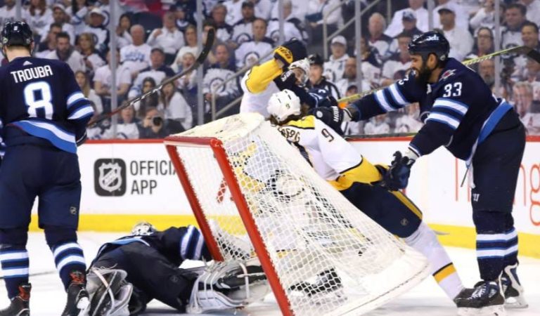 Dustin Byfuglien: The NHL’s Gentle Giant Saves Winnipeg!