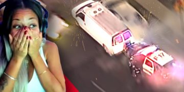 Shocked person reacts to car crash scene.
