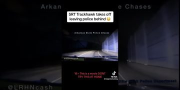 SRT Trackhawk speeds away in police chase video.