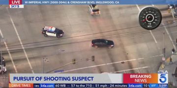 Police chase on Inglewood street, aerial view.