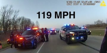 Police cars stop speeder at 119 MPH.