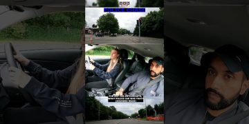 Driving instructor and student in car.
