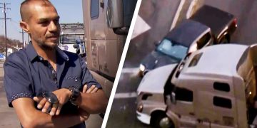 Man standing by truck, truck accident nearby