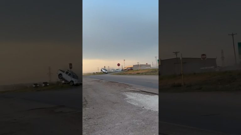 Van crashed off road near intersection.