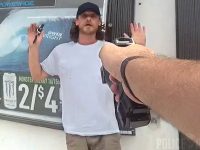 Police aiming taser at person's hands up.