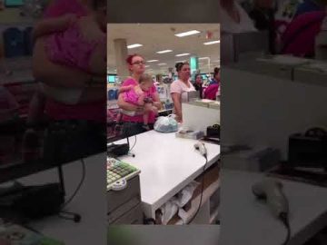 People waiting at store checkout counter