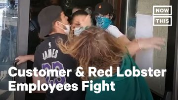Customer fighting with Red Lobster employees outside.