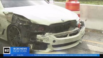 Damaged white car after a traffic accident.