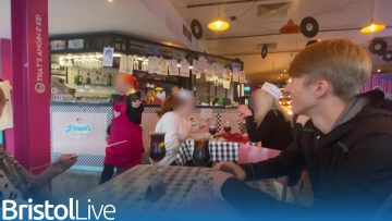 Diners in busy themed restaurant with playful atmosphere.