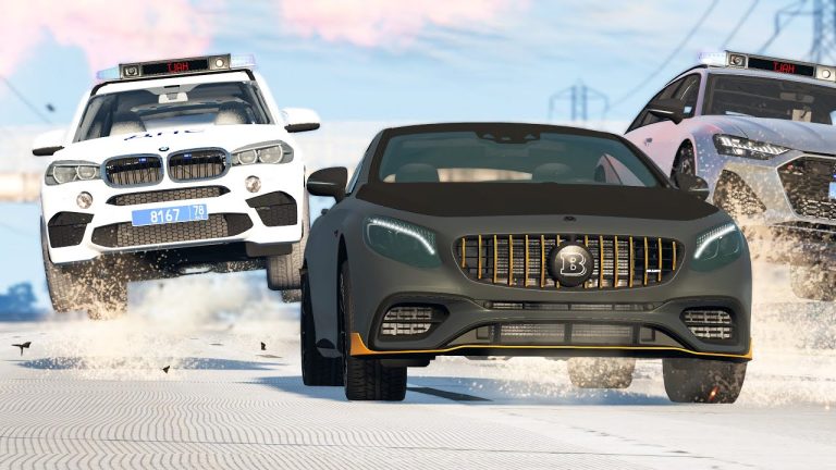 Cars racing on snowy road with police chase