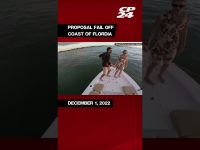 Couple on boat, proposal fail, Florida coast