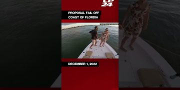 Couple on boat, proposal fail, Florida coast