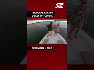 Couple on boat, proposal fail, Florida coast