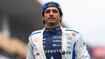Race car driver in racing suit close-up