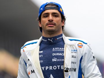 Race car driver in racing suit close-up