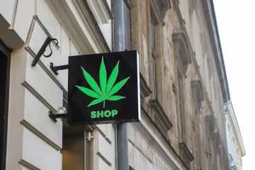 Cannabis shop sign on building exterior