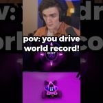Person gaming, driving to break world record.