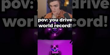 Person gaming, driving to break world record.
