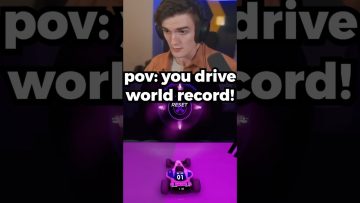 Person gaming, driving to break world record.