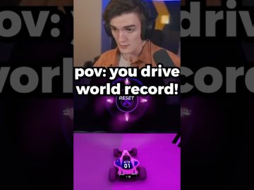 Person gaming, driving to break world record.