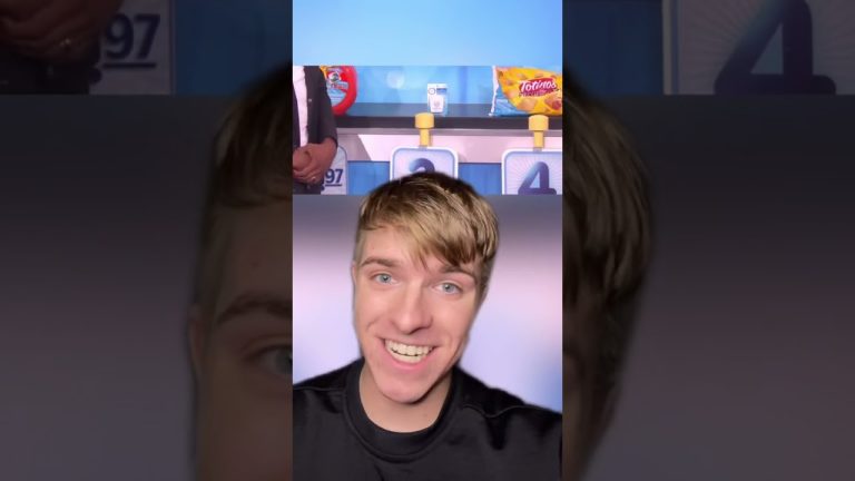 Smiling person in front of product display.