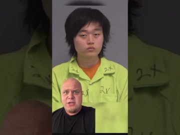 Person in green jumpsuit and another person talking.