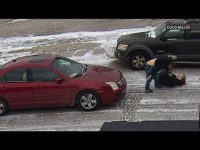 Snowy street altercation between two women.