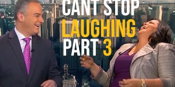 News anchors laughing on live broadcast.