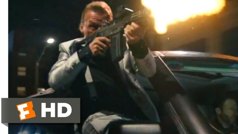 Man firing gun from car at night
