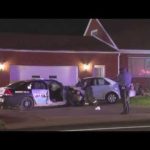 Nighttime police investigation at residential scene