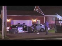 Nighttime police investigation at residential scene