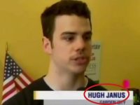 Man interviewed with USA flag background.