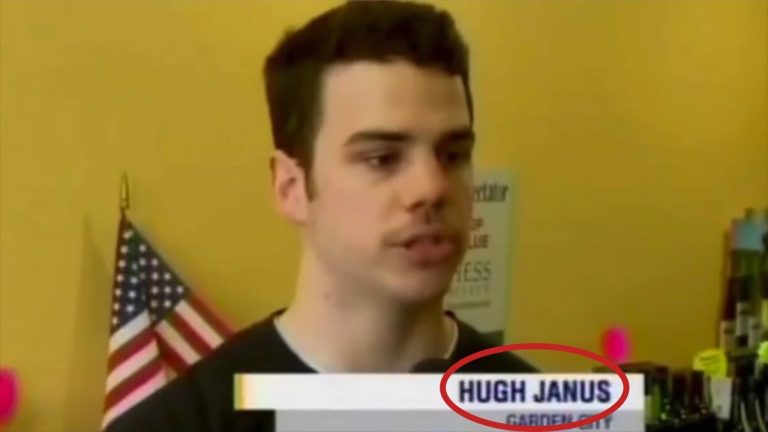 Man interviewed with USA flag background.