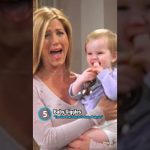 Woman holding laughing baby