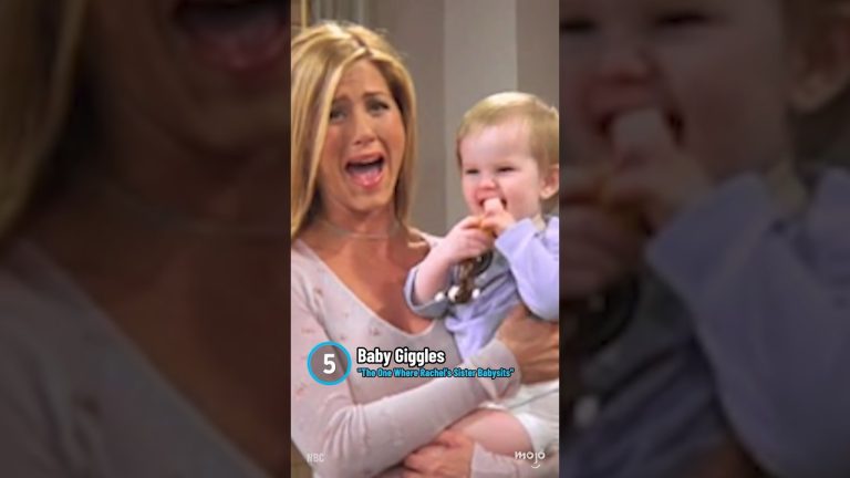 Woman holding laughing baby